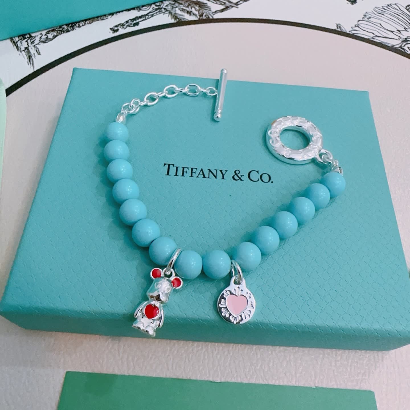 Tiffany & Co. Blue Bead Bracelet with Charms Tiffany & Co. Blue Bead Bracelet with Charms